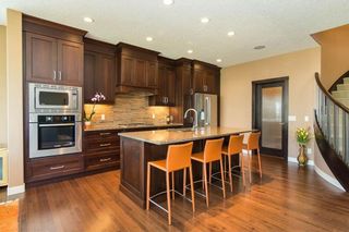 Photo 3: 122 AUBURN SOUND Manor SE in Calgary: Auburn Bay House for sale : MLS®# C4147618