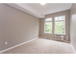 Photo 11: 104 2238 WHATCOM Road in Abbotsford: Abbotsford East Condo for sale in "Waterleaf" : MLS®# R2260128