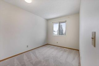 Photo 11: 18 Woodglen Crescent SW in Calgary: Woodbine Detached for sale : MLS®# A2124242