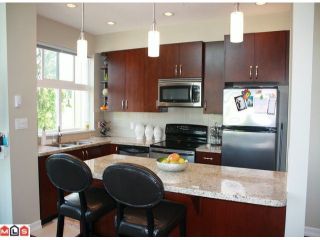 Photo 2: # 410 10237 133RD ST in Surrey: Whalley Condo  in "ETHICAL GARDENS" (North Surrey)  : MLS®# F1116224