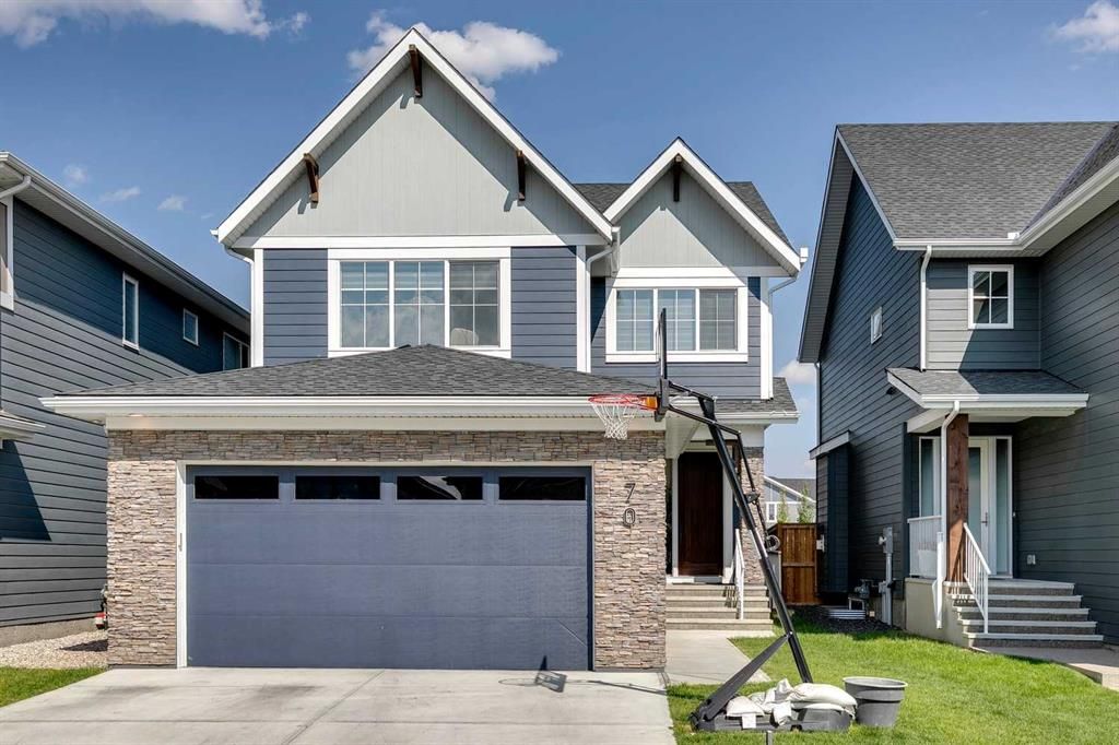 Main Photo: 70 Westmore Park SW in Calgary: West Springs Detached for sale : MLS®# A2064299