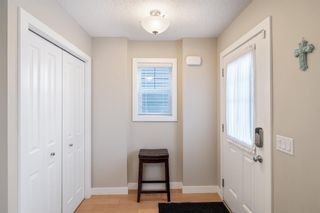 Photo 4: 23 Fireside Parkway: Cochrane Row/Townhouse for sale : MLS®# A1183103