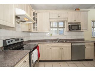 Photo 3: 7736 MAIN Street in Vancouver: South Vancouver 1/2 Duplex for sale (Vancouver East)  : MLS®# V1098254