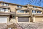 Main Photo: 7034 Edgemont Drive NW in Calgary: Edgemont Row/Townhouse for sale : MLS®# A2122257