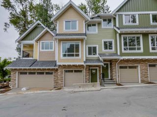 Photo 1: 106 1405 DAYTON Avenue in Coquitlam: Burke Mountain Townhouse for sale in "ERICA" : MLS®# R2084440