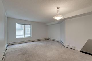 Photo 11: 9104 403 Mackenzie Way SW: Airdrie Apartment for sale : MLS®# A1258339