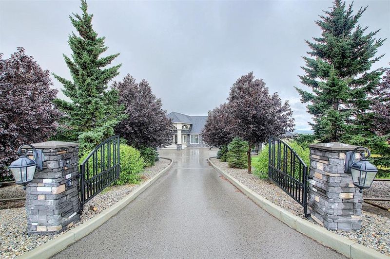 FEATURED LISTING: 250122 Dynasty Drive West Rural Foothills County