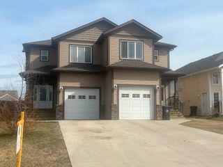 Photo 2: 11014 104A Avenue in Fort St. John: Fort St. John - City NW 1/2 Duplex for sale : MLS®# R2750588