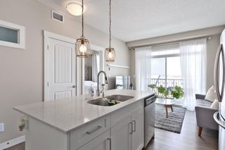 Photo 3: 408 100 Auburn Meadows Common SE in Calgary: Auburn Bay Apartment for sale : MLS®# A2117356