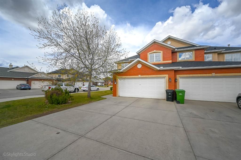 Main Photo: 1545 Strathcona Drive SW in Calgary: Strathcona Park Semi Detached for sale : MLS®# A1219306