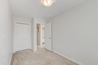 Photo 15: 110 31 Red Embers Parade NE in Calgary: Redstone Row/Townhouse for sale : MLS®# A2033052