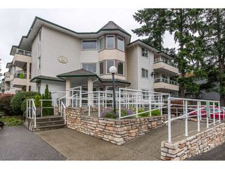 Photo 1: 103 3063 IMMEL Street in Abbotsford: Central Abbotsford Condo for sale in "Clayburn Ridge" : MLS®# R2080632