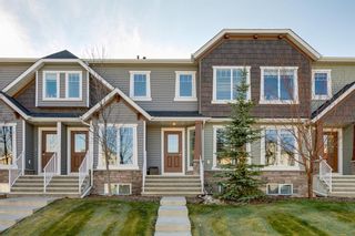 Photo 1: 113 ASPEN HILLS Drive SW in Calgary: Aspen Woods Row/Townhouse for sale : MLS®# A1057562
