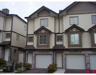 Photo 1: 58 14855 100 Avenue in Surrey: Guildford Townhouse for sale in "Hampstead Mews" (North Surrey)  : MLS®# F2728272