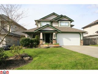 Photo 1: 18127 68TH Avenue in Surrey: Cloverdale BC House for sale in "Cloverwoods" (Cloverdale)  : MLS®# F1109523