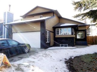 Photo 1: 13903 DEER RUN Boulevard SE in Calgary: Deer Run House for sale : MLS®# C4048969