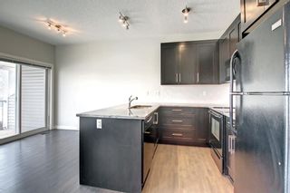 Photo 4: 140 2802 Kings Heights Gate SE: Airdrie Row/Townhouse for sale : MLS®# A1219473