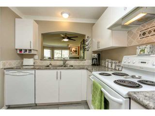 Photo 9: 407 2439 WILSON Avenue in Port Coquitlam: Central Pt Coquitlam Condo for sale in "AVEBURY POINT" : MLS®# V1027199