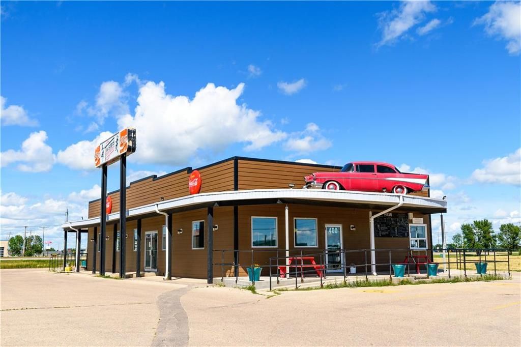 Main Photo: 400 Memorial Drive in Winkler: Industrial / Commercial / Investment for sale (R35 - South Central Plains)  : MLS®# 202330579