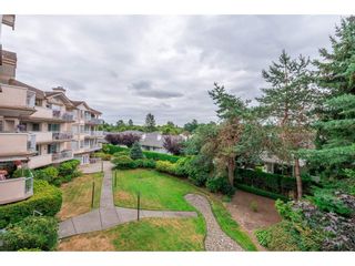 Photo 17: 208 5375 205 Street in Langley: Langley City Condo for sale in "GLENMONT PARK" : MLS®# R2295267