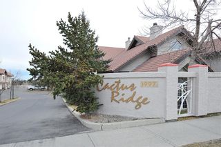 Photo 2: 205 1997 Sirocco Drive SW in Calgary: Signal Hill Row/Townhouse for sale : MLS®# A2102282