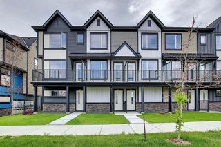 Photo 1: 878 Belmont Drive SW in Calgary: Belmont Row/Townhouse for sale : MLS®# A1013527