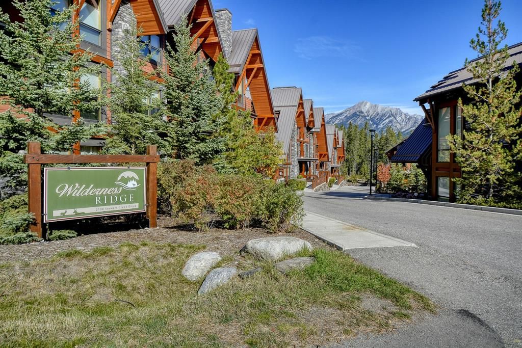Main Photo: 101 2100C Stewart Creek Drive: Canmore Apartment for sale : MLS®# A1149382