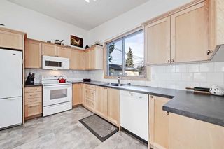 Photo 9: 2424 58 Avenue SW in Calgary: North Glenmore Park Detached for sale : MLS®# A2098169
