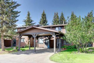 Photo 1: 12 10910 Bonaventure Drive SE in Calgary: Willow Park Row/Townhouse for sale : MLS®# A1250522