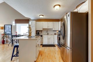 Photo 8: 102 Somervale Point SW in Calgary: Somerset Row/Townhouse for sale : MLS®# A2088078