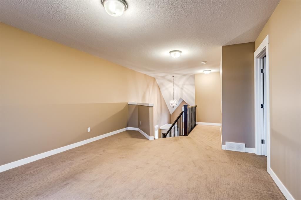 Photo 24: Photos: 228 Rainbow Falls Green: Chestermere Semi Detached for sale : MLS®# A1158715