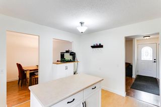 Photo 9: 1410 Hunterbrook Road NW in Calgary: Huntington Hills Detached for sale : MLS®# A1259559