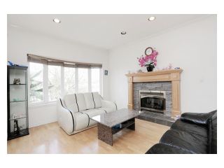 Photo 2: 5518 SHERBROOKE Street in Vancouver: Knight House for sale (Vancouver East)  : MLS®# V943616