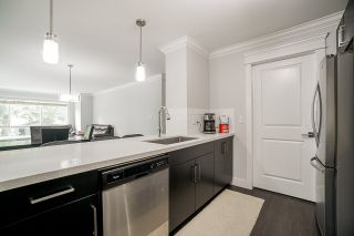 Photo 4: 201 2268 SHAUGHNESSY Street in Port Coquitlam: Central Pt Coquitlam Condo for sale in "UPTOWN POINT" : MLS®# R2485600