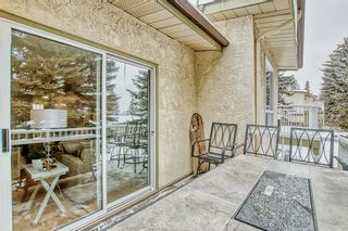 Photo 16: 106 Strathlorne Mews SW in Calgary: Strathcona Park Row/Townhouse for sale : MLS®# A2028228