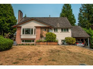 Photo 1: 521 ROXHAM Street in Coquitlam: Coquitlam West House for sale in "COQUITLAM WEST/VANCOUVER GOLF CLUB" : MLS®# V1132951