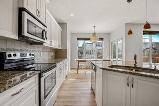 Photo 6: 144 Brightoncrest Manor SE in Calgary: New Brighton Detached for sale : MLS®# A2118191