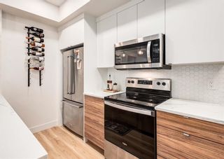 Photo 3: 120 19661 40 Street SE in Calgary: Seton Apartment for sale : MLS®# A2050280