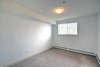 Photo 18: 302 120 Country Village Circle NE in Calgary: Country Hills Village Apartment for sale : MLS®# A1214109