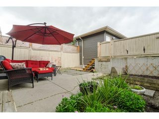 Photo 18: 7817 211B Street in Langley: Willoughby Heights Condo for sale in "Shaughnessy Mews" : MLS®# R2412194