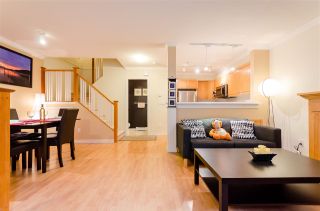 Photo 1: 25 7128 STRIDE Avenue in Burnaby: Edmonds BE Townhouse for sale in "Riverstone" (Burnaby East)  : MLS®# R2220660