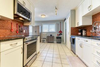 Photo 13: 1012 72 Avenue NW in Calgary: Huntington Hills Detached for sale : MLS®# A2025639