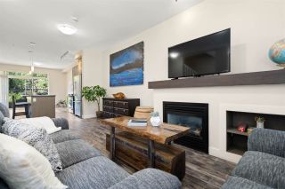 Photo 1: 38327 SUMMITS VIEW Drive in Squamish: Downtown SQ Townhouse for sale in "Eaglewind Natures Gate" : MLS®# R2483866