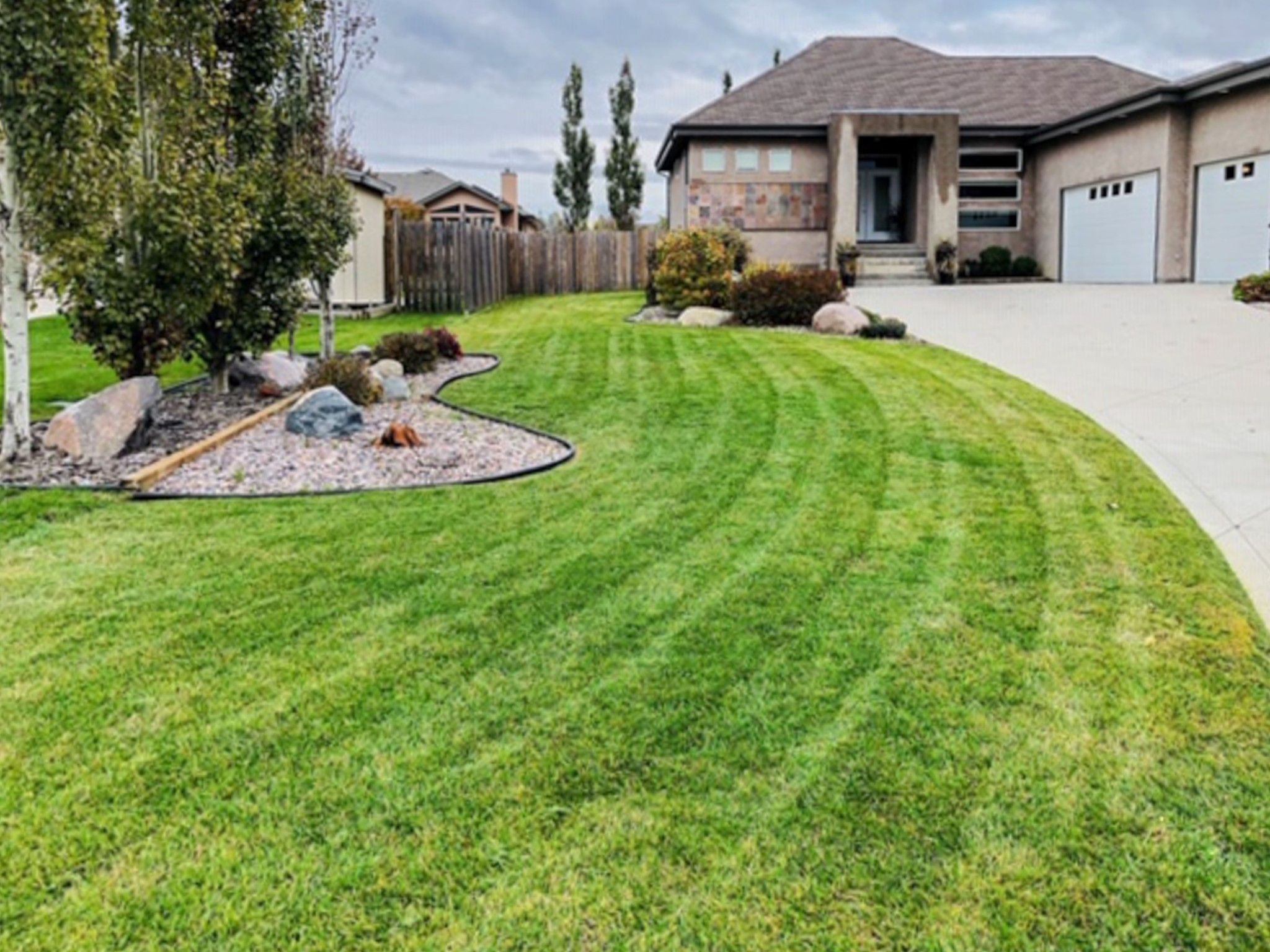 Immaculate custom built 3+ bedroom Bungalow, fully finished basement w/ two additional bedrooms, 34x20 AT3 on fenced and beautifully landscaped 85 x 140 lot in the Town of Oakbank