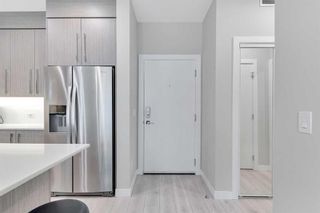 Photo 3: 205 383 Smith Street NW in Calgary: University District Apartment for sale : MLS®# A2107452