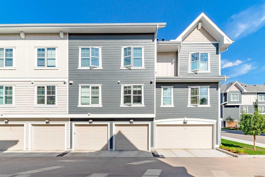 Main Photo: 905 Cranbrook Walk SE in Calgary: Cranston Row/Townhouse for sale : MLS®# A2080126