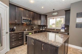 Photo 2: 702 CANOE Avenue SW: Airdrie Detached for sale : MLS®# C4287194