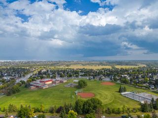 Photo 46: 128 Deerview Drive SE in Calgary: Deer Ridge Semi Detached (Half Duplex) for sale : MLS®# A2085681