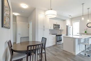 Photo 4: 211 100 Auburn Meadows Manor SE in Calgary: Auburn Bay Apartment for sale : MLS®# A1220075