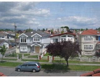Photo 9: 6311 BRUCE Street in Vancouver: Killarney VE House for sale (Vancouver East)  : MLS®# V653313